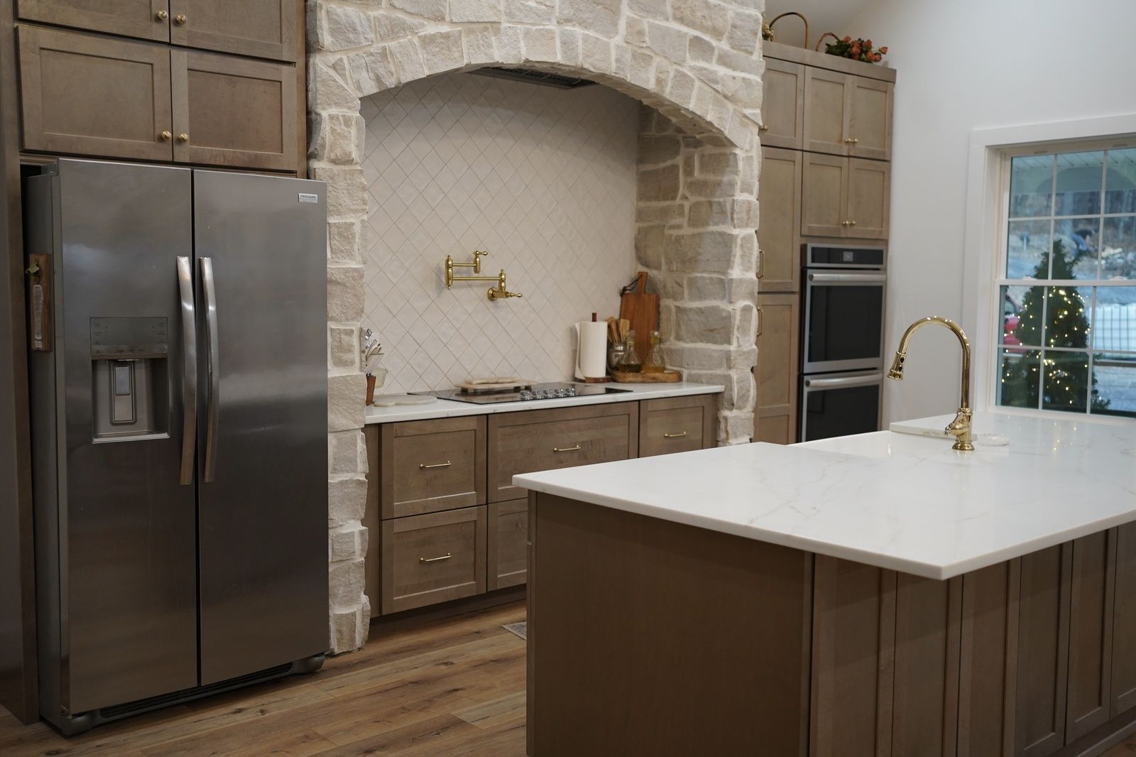 modern kitchen design with stone accents and appliances va