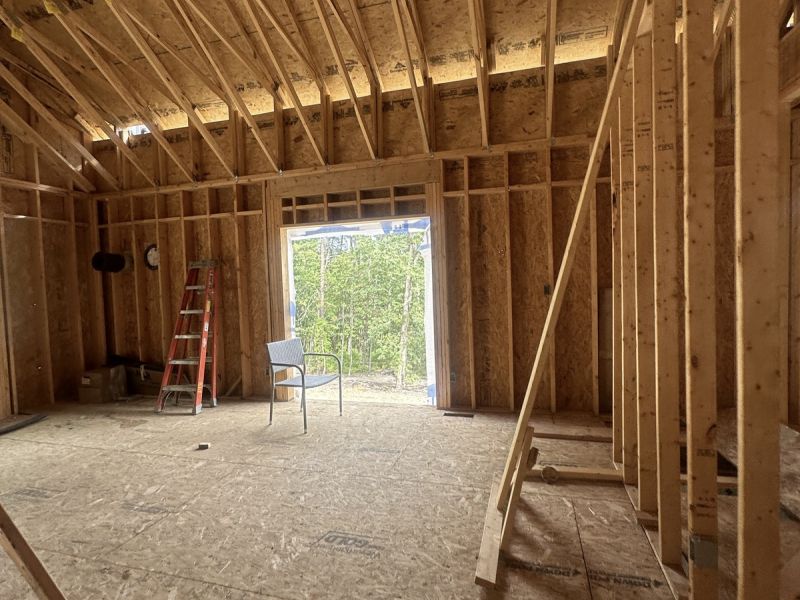 interior frame construction with ladder and chair va