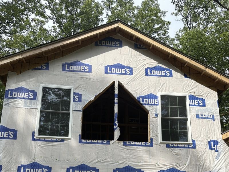new construction house with windows roof repair services in winchester